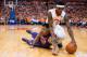 SYRACUSE, NY - FEBRUARY 9: K.J. McDaniels #32 of the Clemson Tigers and C.J. Fair #5 of the Syracuse Orange battle for a loose ball during the second half on February 9, 2014 at The Carrier Dome in Syracuse, New York. Syracuse defeats Clemson 57-44. (Ph