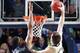SOUTH BEND, IN - JANUARY 4: Pat Connaughton #24 of the Notre Dame Fighting Irish dunks the ball against Jabari Parker #1 of the Duke Blue Devils during the game at Purcell Pavilion at the Joyce Center on January 4, 2014 in South Bend, Indiana. Notre Dame