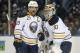 BUFFALO, NY - JANUARY 29: Jason Pominville #29 of the Buffalo Sabres talks to Ryan Miller #30 after scoring a goal during an NHL game against the Toronto Maple Leafs at First Niagara Center on January 29, 2013 in Buffalo, New York. (Photo by Tom Szczerbo