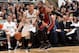 SAN ANTONIO, TX - JUNE 05: Danny Green #4 of the San Antonio Spurs drives to the basket against Dwyane Wade #3 of the Miami Heat during Game One of the 2014 NBA Finals between the Miami Heat and San Antonio Spurs at AT&T Center on June 5, 2014 in San Anto