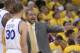 May 1, 2014; Oakland, CA, USA; Golden State Warriors head coach Mark Jackson (right) instructs guard Stephen Curry (30) against the Los Angeles Clippers during the second quarter in game six of the first round of the 2014 NBA Playoffs at Oracle Arena. Man