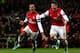 LONDON, ENGLAND - DECEMBER 29: Theo Walcott of Arsenal celebrates scoring his hat trick and Arsenal's seventh goal with Olivier Giroud of Arsenal during the Barclays Premier League match between Arsenal and Newcastle United at the Emirates Stadium on Dece
