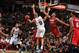 SAN ANTONIO, TX - JUNE 5: Tony Parker #9 of the San Antonio Spurs passes the ball to Tim Duncan #21 against the Miami Heat during Game One of the 2014 NBA Finals on June 5, 2014 at AT&T Center in San Antonio, Texas. NOTE TO USER: User expressly acknowledg