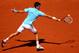 PARIS, FRANCE - JUNE 06: Novak Djokovic of Serbia returns a shot during his men's singles semi-final match against Ernests Gulbis of Latvia on day thirteen of the French Open at Roland Garros on June 6, 2014 in Paris, France. (Photo by Clive Brunskill/G