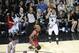 Jun 5, 2014; San Antonio, TX, USA; San Antonio Spurs guard Danny Green (4) shoots a three point basket in the fourth quarter against the Miami Heat in game one of the 2014 NBA Finals at AT&T Center. The Spurs beat the Heat 110-95. Mandatory Credit: Brend