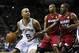 Jun 5, 2014; San Antonio, TX, USA; San Antonio Spurs guard Tony Parker (9) shoots the ball against Miami Heat guard Mario Chalmers (15) during the first quarter in game one of the 2014 NBA Finals at AT&T Center. Mandatory Credit: Soobum Im-USA TODAY Sport