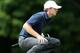 Oct 3, 2013; Dublin, OH, USA; Jordan Speith lines up a putt on the first hole during the Thursday four ball matches of the Presidents Cup at Muirfield Village Golf Club. Mandatory Credit: Brian Spurlock-USA TODAY Sports
