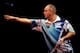 LONDON, ENGLAND - DECEMBER 27: Ian White of England in action during his third round match against Richie Burnett of Wales on day twelve of the Ladbrokes.com World Darts Championship at Alexandra Palace on December 27, 2013 in London, England. (Photo by