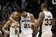 Jun 5, 2014; San Antonio, TX, USA; San Antonio Spurs guard Tony Parker (9) celebrates with San Antonio Spurs forward Tim Duncan (21) and forward Boris Diaw (33) during the fourth quarter in game one of the 2014 NBA Finals at AT&T Center. Mandatory Credit: