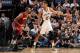 SAN ANTONIO, TX - JUNE 05: Tim Duncan #21 of the San Antonio Spurs handles the basketball against Chris Bosh #1 of the Miami Heat during Game One of the 2014 NBA Finals between the Miami Heat and San Antonio Spurs at AT&T Center on June 5, 2014 in San Ant