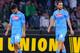 NAPLES, ITALY - MARCH 20: Lorenzo Insigne and Gonzalo Higuain of SSC Napoli look dejected after the UEFA Europa League Round of 16 match between SSC Napoli and FC Porto at Stadio San Paolo on March 20, 2014 in Naples, Italy. (Photo by Giuseppe Bellini/G