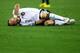 DURBAN, SOUTH AFRICA - JUNE 13: Injured Bastian Schweinsteiger lies on the ground during the 2010 FIFA World Cup South Africa Group D match between Germany and Australia at Durban Stadium on June 13, 2010 in Durban, South Africa. (Photo by Lars Baron/Ge