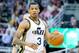 Apr 4, 2014; Salt Lake City, UT, USA; Utah Jazz guard Trey Burke (3) dribbles up the court during the second half against the New Orleans Pelicans at EnergySolutions Arena. The Jazz won 100-96. Mandatory Credit: Russ Isabella-USA TODAY Sports