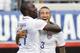 Jun 7, 2014; Jacksonville, FL, USA; United States forward Jozy Altidore (17) is congratulated by defender Fabian Johnson (23) after Altidore scored against the Nigeria at EverBank Field. Mandatory Credit: Kim Klement-USA TODAY Sports