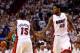 MIAMI, FL - JUNE 09: (R-L) Udonis Haslem #40 gives teammate Mario Chalmers #15 of the Miami Heat a five in the first quarter while taking on the Boston Celtics in Game Seven of the Eastern Conference Finals in the 2012 NBA Playoffs on June 9, 2012 at Ame