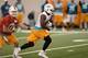 Ryan Tannehill hands off to Knowshon Moreno during OTAs.