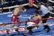 Jun 7, 2014; New York, NY, USA; Sergio Martinez goes down after a punch from Miguel Cotto in the first round of WBC World Middleweight fight at Madison Square Garden. Migul Cotto won by TKO. Mandatory Credit: Noah K. Murray-USA TODAY Sports