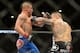 Jun 7, 2014; Albuquerque, NM, USA; Diego Sanchez (red) and Ross Pearson (blue) fight during their lightweight bout during UFC Fight Night 42 at Tingley Coliseum. Sanchez won via split decision. Mandatory Credit: Joe Camporeale-USA TODAY Sports