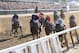Jun 7, 2014; Elmont, NY, USA; Joel Rosario aboard Tonalist (blue and red) wins the 2014 Belmont Stakes as Javier Castellano aboard Commissioner (far right) Robby Albarado aboard Medal Count (orange and purple) and Victor Espinoza aboard California Chrome