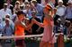 PARIS, FRANCE - JUNE 07: Simona Halep of Romania shakes hands with Maria Sharapova of Russia after their women's singles final match on day fourteen of the French Open at Roland Garros on June 7, 2014 in Paris, France. (Photo by Matthew Stockman/Getty I