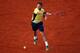 PARIS, FRANCE - MAY 26: Stanislas Wawrinka of Switzerland returns a shot during his men's singles match against Guillermo Garcia-Lopez of Spain on day two of the French Open at Roland Garros on May 26, 2014 in Paris, France. (Photo by Clive Brunskill/Ge