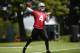 ALAMEDA, CA - MAY 16: Derek Carr #4 of the Oakland Raiders participates in drills during Rookie Minicamp on May 16, 2014 in Alameda, California. (Photo by Thearon W. Henderson/Getty Images)