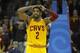 Apr 5, 2014; Cleveland, OH, USA; Cleveland Cavaliers guard Kyrie Irving (2) reacts after missing a shot in overtime against the Charlotte Bobcats at Quicken Loans Arena. Mandatory Credit: David Richard-USA TODAY Sports