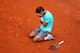 PARIS, FRANCE - JUNE 08: Rafael Nadal of Spain celebrates match point during his men's singles final match against Novak Djokovic of Serbia on day fifteen of the French Open at Roland Garros on June 8, 2014 in Paris, France. (Photo by Clive Brunskill/Ge