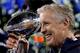 EAST RUTHERFORD, NJ - FEBRUARY 02: Head coach Pete Carroll of the Seattle Seahawks celebrates with the Vince Lombardi Trophy after their 43-8 victory over the Denver Broncos during Super Bowl XLVIII at MetLife Stadium on February 2, 2014 in East Rutherfo