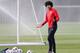 MANCHESTER, ENGLAND - MARCH 31: Marouane Fellaini of Manchester United looks on during a training session at the Aon Training Complex on March 31, 2014 in Manchester, England. (Photo by Alex Livesey/Getty Images)