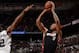 SAN ANTONIO, TX - JUNE 08: Rashard Lewis #9 of the Miami Heat shoots against Kawhi Leonard #2 of the San Antonio Spurs during Game Two of the 2014 NBA Finals between the Miami Heat and San Antonio Spurs at AT&T Center on June 8, 2014 in San Antonio, Texas