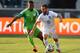 CHESTER, PA - JUNE 3: Ioannis Fetfatzidis #18 of Greece tries to work the ball around Elderson Echiéjilé #3 of Nigeria during an international friendly match at PPL Park on June 3, 2014 in Chester, Pennsylvania. (Photo by Drew Hallowell/Getty Images)