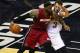 SAN ANTONIO, TX - JUNE 5: LeBron James #6 of the Miami Heat holds the ball away from Marco Belinelli #3 of the San Antonio Spurs in Game One of the 2014 NBA Finals at the AT&T Center on June 5, 2014 in San Antonio, Texas. NOTE TO USER: User expressly ackn