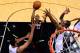 SAN ANTONIO, TX - JUNE 08: Mario Chalmers #15 of the Miami Heat goes to the basket against the San Antonio Spurs during Game Two of the 2014 NBA Finals at the AT&T Center on June 8, 2014 in San Antonio, Texas. NOTE TO USER: User expressly acknowledges and