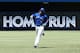 TORONTO, CANADA - MAY 25: Edwin Encarnacion #10 of the Toronto Blue Jays circles the bases as he hits a solo home run in the fourth inning during MLB game action against the Oakland Athletics on May 25, 2014 at Rogers Centre in Toronto, Ontario, Canada. (