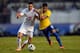 SAO PAULO, BRAZIL - JUNE 06: Neymar (R) of Brazil and Tadic of Serbia compete for the ball during the International Friendly Match between Brazil and Serbia at Morumbi Stadium on June 06, 2014 in Sao Paulo, Brazil. (Photo by Buda Mendes/Getty Images)