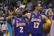 EAST RUTHERFORD, NJ - JUNE 12: Derek Fisher #2 and Rick Fox #17 of the Los Angeles Lakers celebrate the Lakers championship after Game four of the 2002 NBA Finals against the New Jersey Nets on June 12, 2002 at Continental Airlines Arena in East Rutherfo