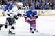 NEW YORK, NY - JUNE 09: Martin St. Louis #26 of the New York Rangers skates against Justin Williams #14 of the Los Angeles Kings during Game Three of the 2014 NHL Stanley Cup Final at Madison Square Garden on June 9, 2014 in New York City. (Photo by Scot