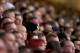 LIVERPOOL, ENGLAND - APRIL 15: Liverpool supporters attend the memorial service marking the 25th anniversary of the Hillsborough Disaster at Anfield stadium on April 15, 2014 in Liverpool, England. Thousands of fans, friends and relatives took part in th