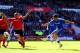 CARDIFF, WALES - MAY 11: Eden Hazard of Chelsea shoots past Steven Caulker of Cardiff City during the Barclays Premier League match between Cardiff City and Chelsea at Cardiff City Stadium on May 11, 2014 in Cardiff, Wales. (Photo by Michael Steele/Gett