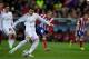 MADRID, SPAIN - FEBRUARY 11: Cristiano Ronaldo of Real Madrid CF scores their opening goal from a penalty shot during the Copa del Rey semi-final second leg match between Club Atletico de Madrid and Real Madrid CF at Vicente Calderon Stadium on February