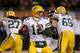 CHICAGO, IL - DECEMBER 29: Aaron Rodgers #12 of the Green Bay Packers looks for a receiver against the Chicago Bears at Soldier Field on December 29, 2013 in Chicago, Illinois. The Packers defeated the Bears 33-28. (Photo by Jonathan Daniel/Getty Images