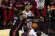 SAN ANTONIO, TX - JUNE 8: LeBron James #6 of the Miami Heat fouls Tim Duncan #21 of the San Antonio Spurs in Game Two of the 2014 NBA Finals at the AT&T Center on June 8, 2014 in San Antonio, Texas. NOTE TO USER: User expressly acknowledges and agrees th