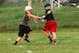 Osborne, left, has come a long way since first strapping on a helmet last year.