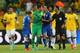 SALVADOR, BRAZIL - JUNE 22: Julio Cesar and Marcelo of Brazil complain to the Referee Ravshan Irmatov after Italy's second goal during the FIFA Confederations Cup Brazil 2013 Group A match between Italy and Brazil at Estadio Octavio Mangabeira (Arena Fo