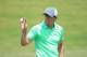 PINEHURST, NC - JUNE 10: Rory McIlroy of Northern Ireland catches a golf ball on the practice range during a practice round prior to the start of the 114th U.S. Open at Pinehurst Resort & Country Club, Course No. 2 on June 10, 2014 in Pinehurst, North Ca