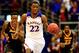 LAWRENCE, KS - NOVEMBER 22: Andrew Wiggins #22 of the Kansas Jayhawks drives upcourt on a fast break as Timajh Parker-Rivera #15 and Rafriel Guthrie #22 of the Towson Tigers chase during the game at Allen Fieldhouse on November 22, 2013 in Lawrence, Kansa