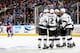 NEW YORK, NY - JUNE 09: Jake Muzzin #6 of the Los Angeles Kings celebrates with his linemates Marian Gaborik #12 and Jeff Carter #77 after scoring against the New York Rangers during the second period of Game Three of the 2014 Stanley Cup Final at Madiso