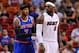Apr 6, 2014; Miami, FL, USA; New York Knicks forward Carmelo Anthony (7) guards Miami Heat forward LeBron James (6) during the first half at American Airlines Arena. Mandatory Credit: Steve Mitchell-USA TODAY Sports