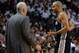 Jun 10, 2014; Miami, FL, USA; San Antonio Spurs guard Tony Parker (9) talks with head coach Gregg Popovich during the first half of game three of the 2014 NBA Finals against the Miami Heat at American Airlines Arena. Mandatory Credit: Steve Mitchell-USA T